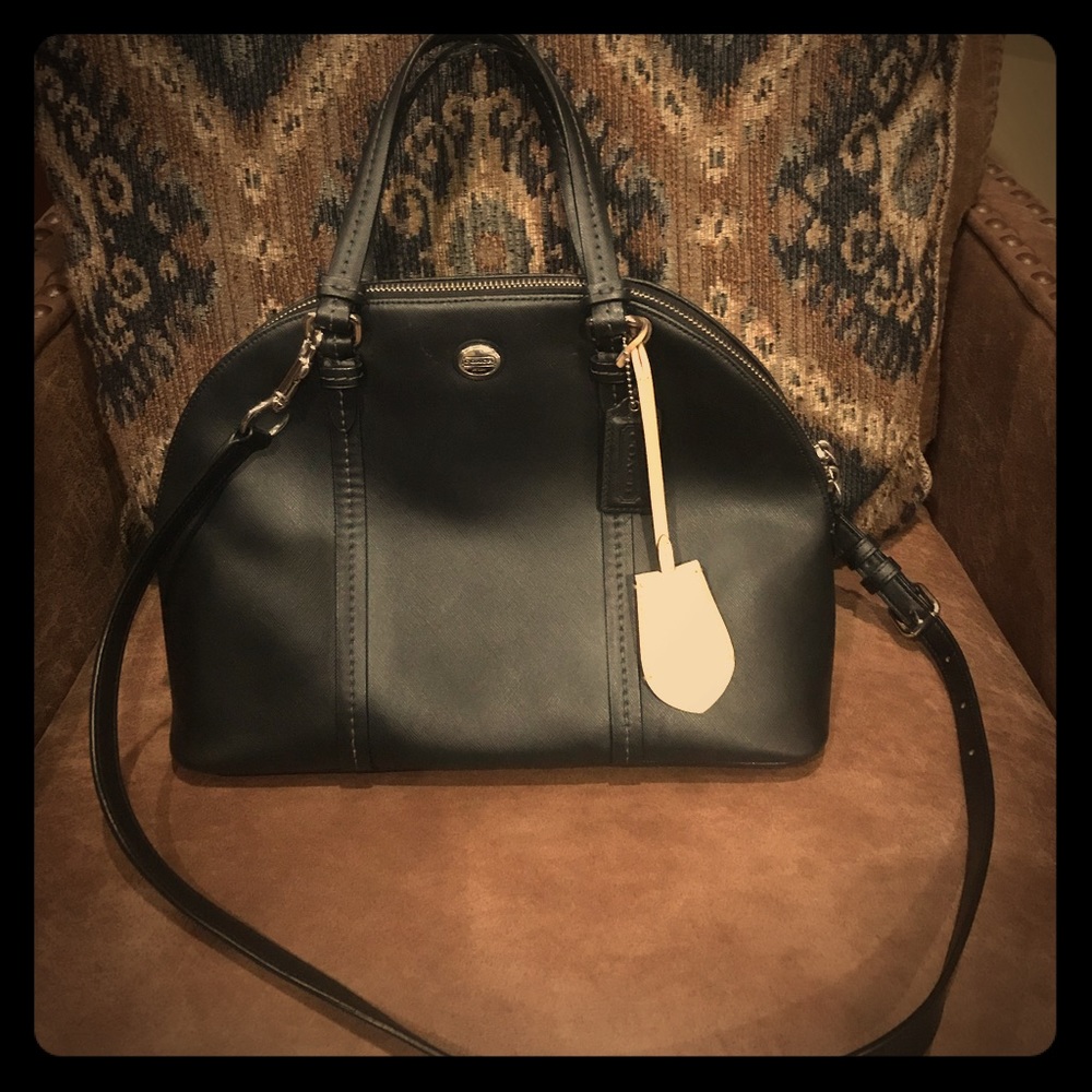 Medium sized black cross body Coach purse